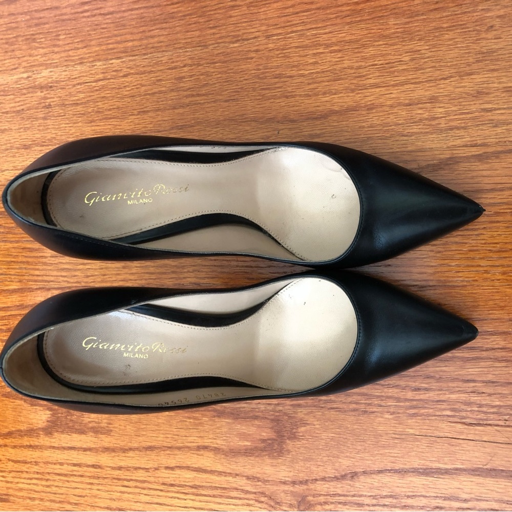 black calf leather pump. A pointed toe signature style. Four inch heel